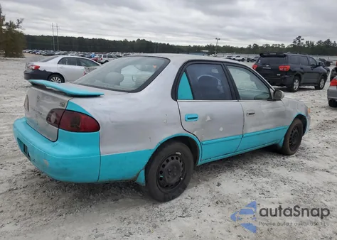 2002 Toyota Corolla Ce z USA, uszkodzony, nr VIN 2T1BR12E82C542064